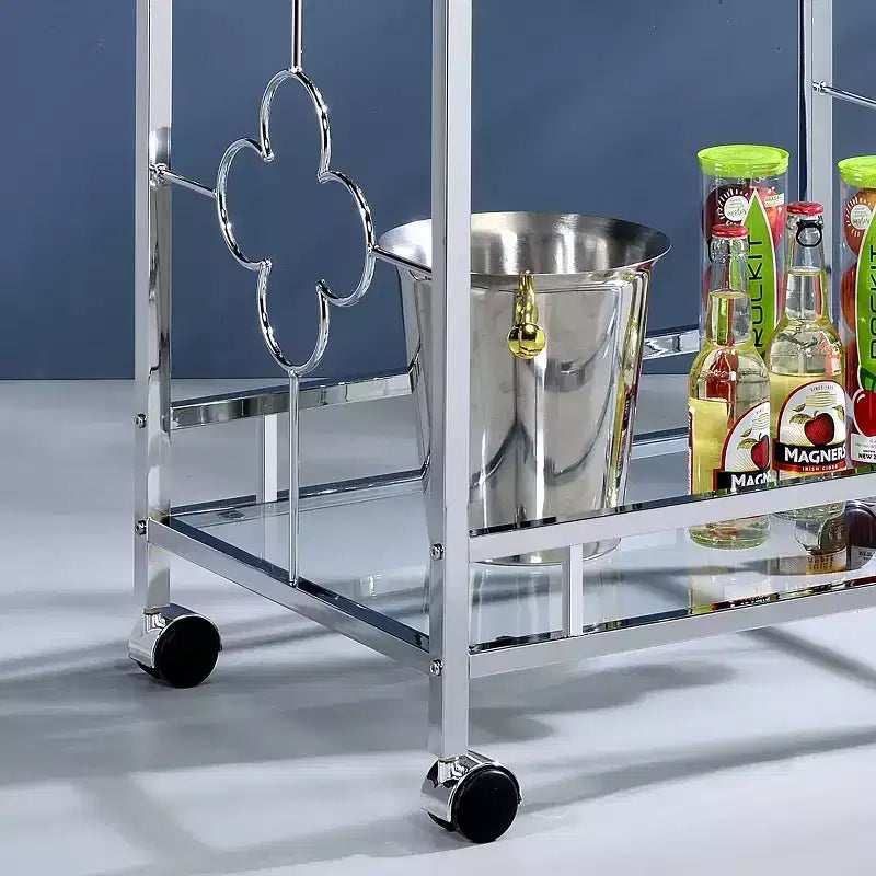 Desserte chromée avec 2 étagères en verre trempé, motif quadrilobe, roulettes, capacité de 22,7 kg